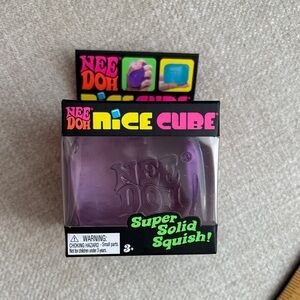 NeeDoh Nice Cube – Transparent Purple Super Solid Squish Toy | Sensory Stress Re